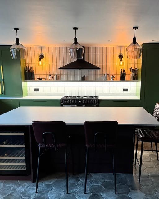 Kitchen island with pendant and wall lights