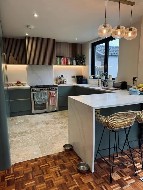 Kitchen with pendant lights and under-cabinet lighting